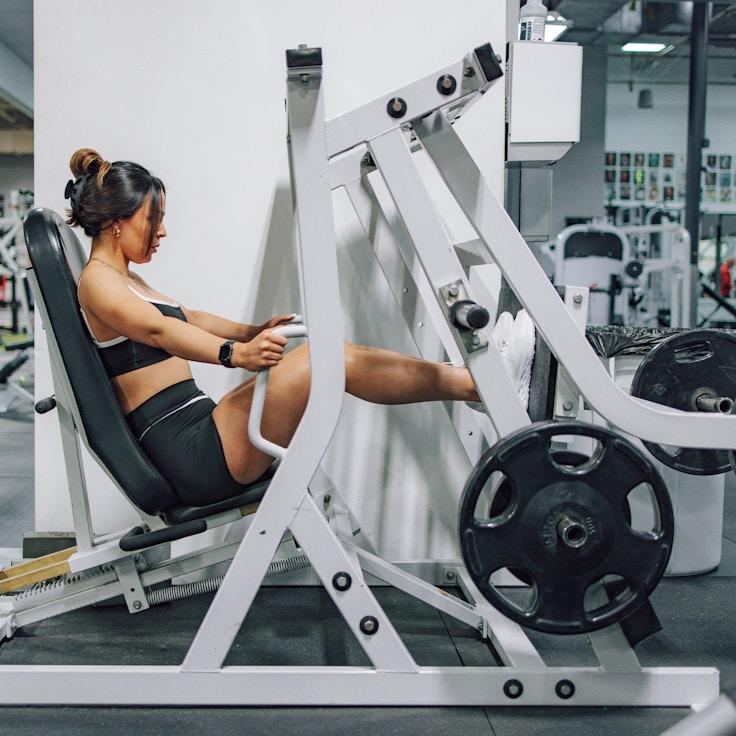 Women in a fitness class doing stretching and mobility exercises
